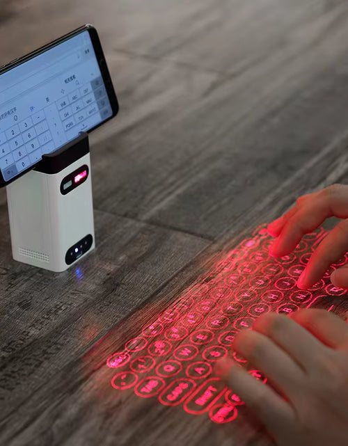 Load image into Gallery viewer, Mini Wireless Laser Projection Keyboard Bluetooth Virtual Keyboard &amp; Mouse Function for Laptop Smartphone Keyboard Projector
